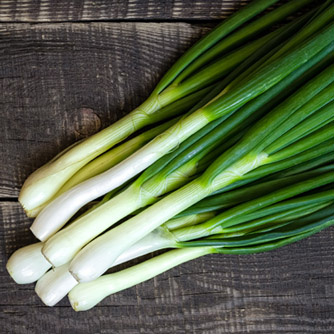 Spring onions cleaned and ready for cooking